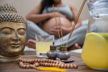 Pregnant woman resting and doing yoga poses