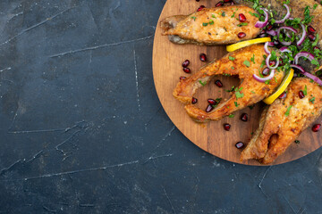 top view tasty fried fish sliced with onions and pomegranates on dark background meat seafood dinner water color meal
