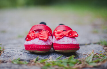 red baby shoes