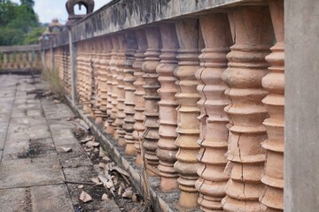 Clay balusters on the territory of a temple in Thailand