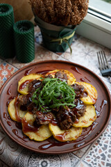 Chicken liver with apples, cherry sauce and arugula