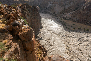 Augrabies national park in South Africa is a nature reserve with the Orange river running through it.
