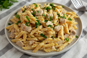 Homemade One-Pot Chicken Alfredo Pasta with Parsley.