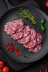 Delicious smoked sausage with bacon, salt, spices and herbs