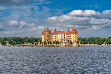 Fototapeta premium View of Moritzburg Baroque palace with 4 towers on an artificial island in Saxony