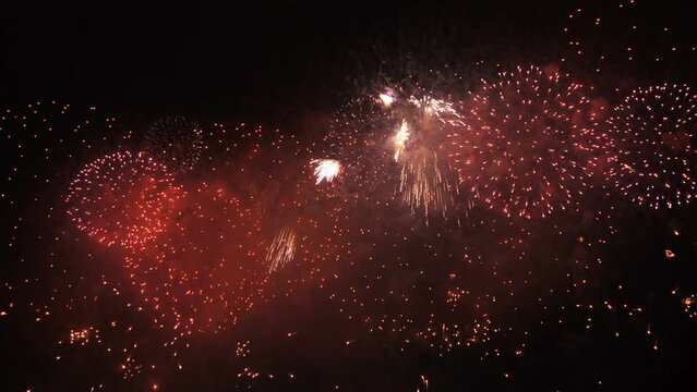 Red fireworks lighting up the sky