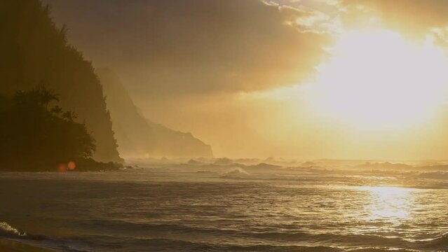 Sunset over the ocean. Time lapse footage of Na Pali Coast in Kauai, Hawaii.