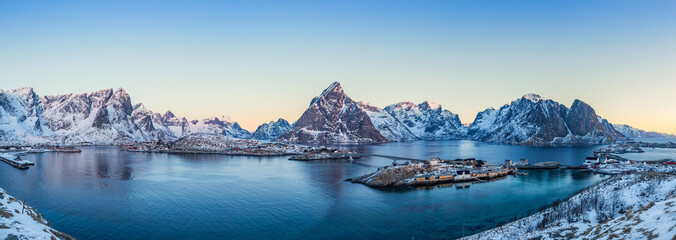 Panorama of the small town of Reine at the very end of the Lofoten in the northern part of Norway during sunrise