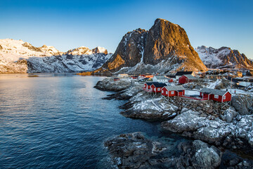 Fototapeta na wymiar The small town of Reine at the very end of the Lofoten in the northern part of Norway during sunrise