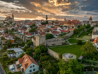 Fototapeta premium Sunset sky aerial view of Znojmo medieval border town with Renaissance town square walls in Czechia