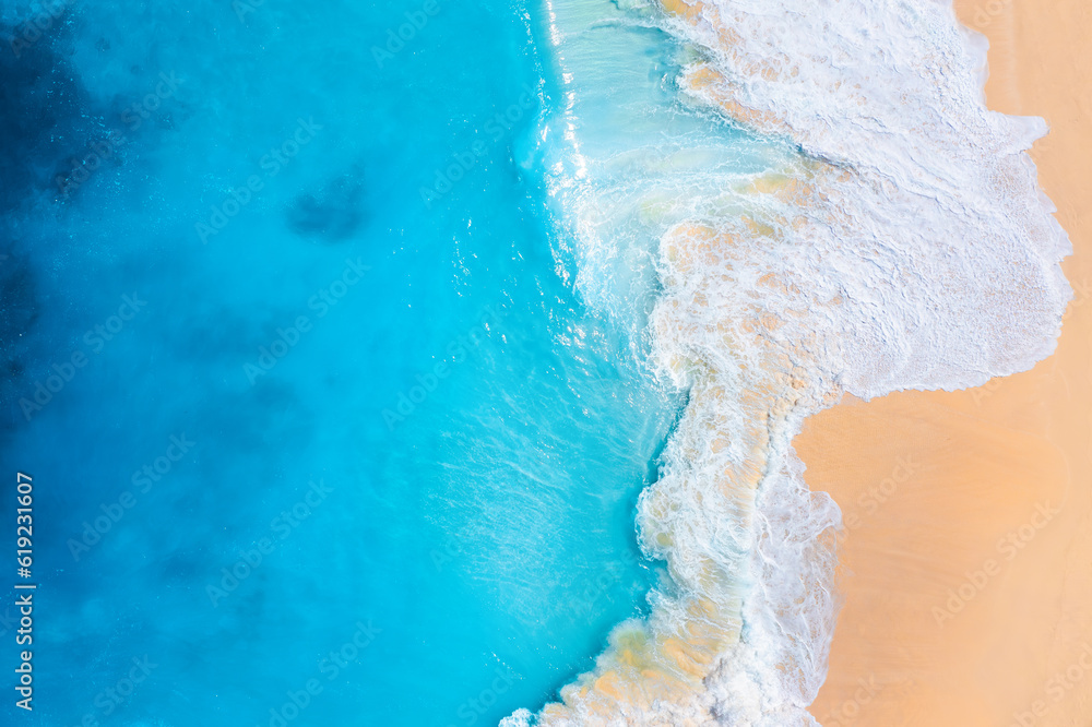 Canvas Prints coast as a background from top view. waves and beach. aerial landscape. azure water background from 