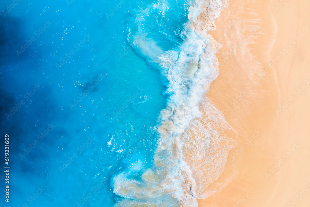 Canvas Prints coast as a background from top view. waves and beach. aerial landscape. azure water background from 