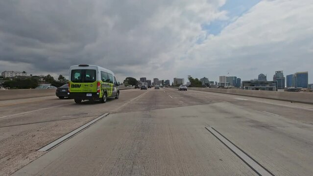 Car driving on the road in San Diego, California. Hyper lapse motion.