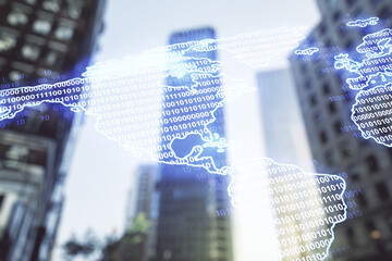 Double exposure of graphic America map hologram on blurry cityscape background, big data and digital technology concept