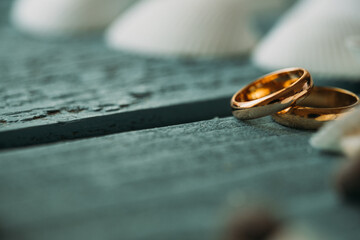 wedding rings on summer table