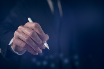 paperless concept. businessman holding pen signing on electronic form documentation checklist, questionnaire survey, data management, application.background and copy space , electronic signing