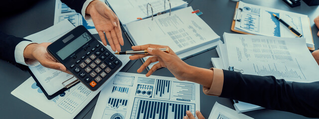 Auditor and accountant team working in office, analyze financial data and accounting record with...