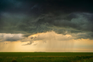 Naklejka na ściany i meble Summer thunder storm clouds over the prairies 