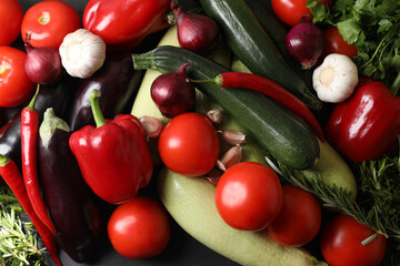 Cooking delicious ratatouille. Fresh ripe vegetables as background, top view