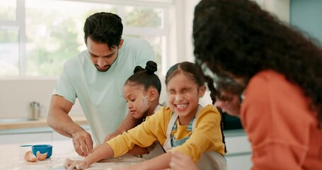 Learning, kitchen and parents baking with their children for child development in their house. Happy, love and young mother and father teaching their girl kids to cook dinner, supper or meal at home.