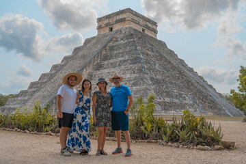 Family vacations in the tourist pyramids of Chichen Itza in the Riviera Mayan archaeological zone