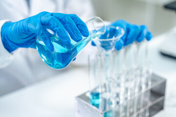 Fototapeta premium Chemical laboratory research with scientific tube and flask glassware equipment, science medicine liquid experiment test on Chemistry, Biotechnology, or Biology for business medicals development