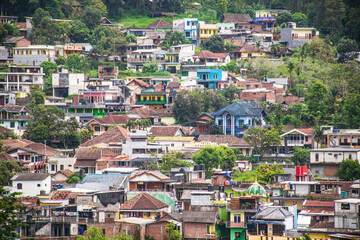 Residential settlements are starting to get denser on the hillsides of tropical forest areas
