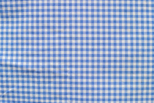 Blue and white gingham fabric with white stripes. Wallpaper text area