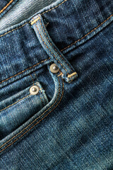 Detail of a front pocket of a blue denim - 619264896