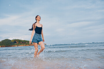 woman summer sea sunset young smile travel running lifestyle copy space beach
