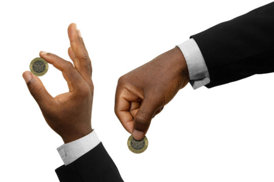 Black Hands holding Ghanaian 2 cedi coin isolated on transparent background. Hand holding coin