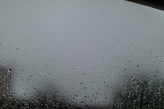 Rain drops on a window glass overlay frame texture 