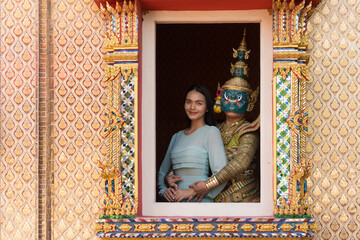 A striking photo featuring an actor as Ravana alongside a Thai woman in Khon drama, based on the Ramayana. Both are adorned in traditional attire
