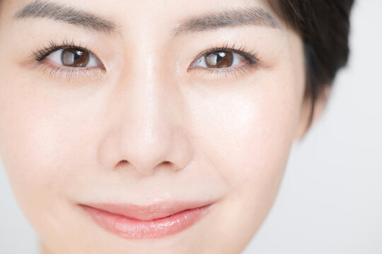 Up close-up of a healthy and beautiful Asian woman with bare skin Beauty Image　
