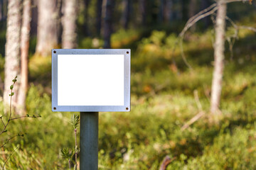 Empty white sign in forest