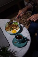 person eating a meal in the restaurant