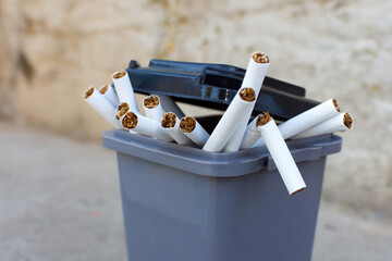 cigarettes in the trash can. to give up smoking