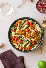 Pasta with shrimp, asparagus and tomatoes. Healthy eating. Diet.