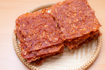 Sliced sheets of dried and crispy pork