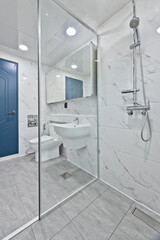 Bathroom interior with Bianco tiles