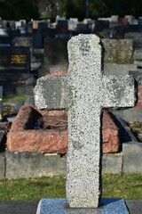 Chipped granite tombstone