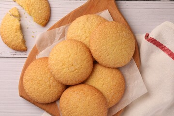 Delicious Danish butter cookies on white wooden table, flat lay