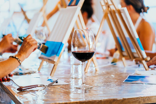 Paint and Sip Workshop: Women Enjoying Wine and Art