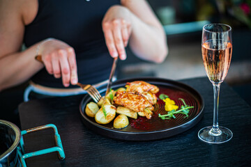 woman eating, in the cafe