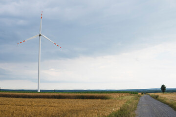 wind turbines generating power in the field
