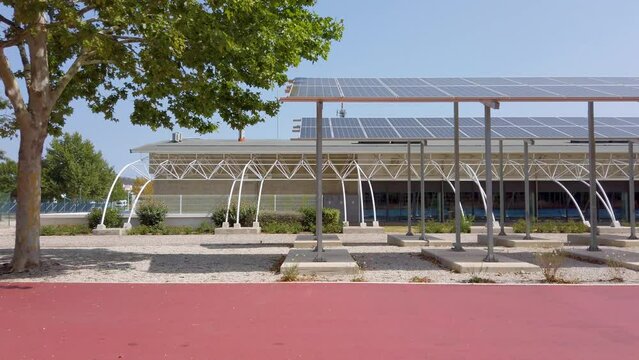 View of the thermal solar panels and green energy of a sports center and swimming pool
