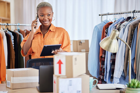 Black woman, phone call and communication in small business of fashion designer for orders at boutique. Happy African female person talking on smartphone with boxes in logistics, courier or delivery