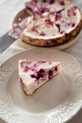 Cottage cheese casserole on a plate with berries. Healthy food, baby meal