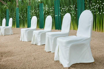 chairs wedding set up on the beach at Thailand.