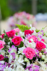 Floral arrangement at a wedding ceremony on beach.